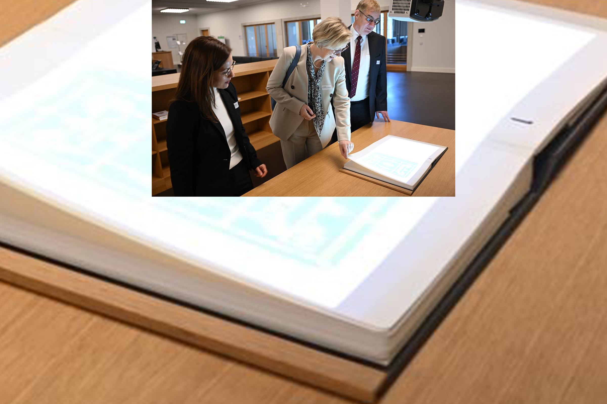 Dr. Carina Gerlach (PIZ Chemnitz), Eva Schewior (DPMA) und Prof. Dr. Uwe Götze (Universität Chemnitz) mit dem interaktiven "Zauberbuch"