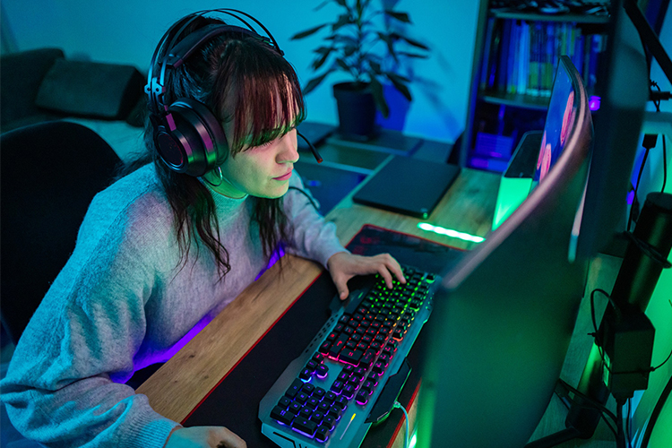Woman at gaming computer