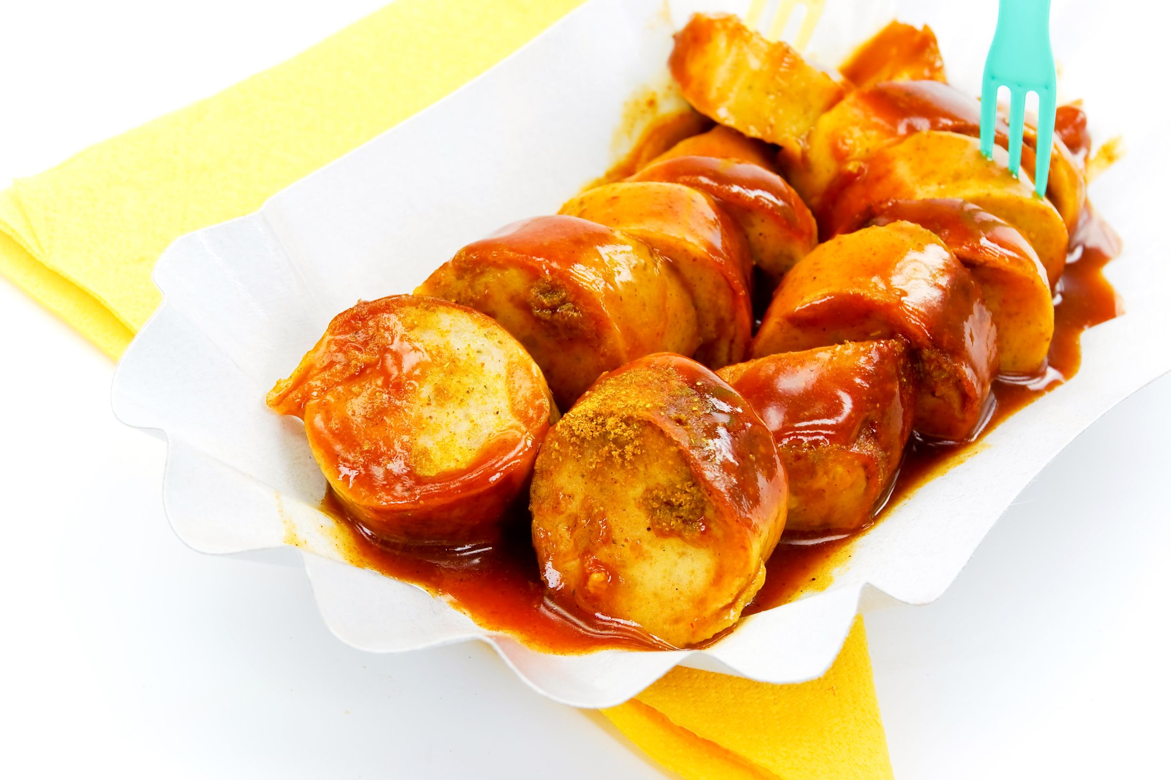 Currywurst on paper plate