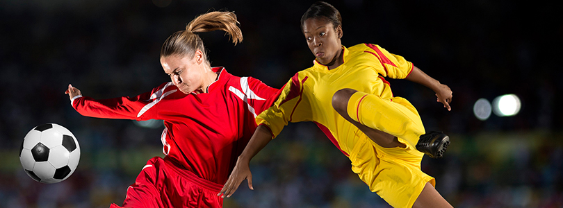 Femal footbballers in action